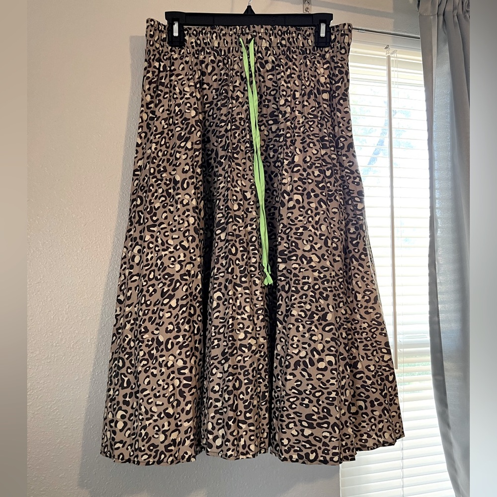 WILD FABLE | Leopard A-Line Skirt - rain coat material w/like green drawstring